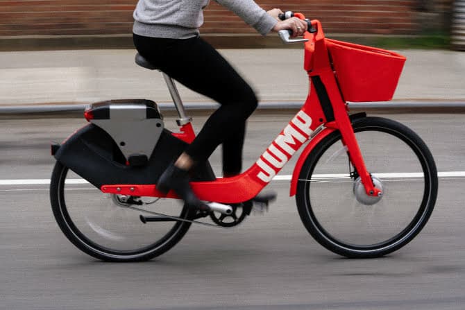 Uber introduces electric bicycle in Rotterdam with bright red JUMP bikes