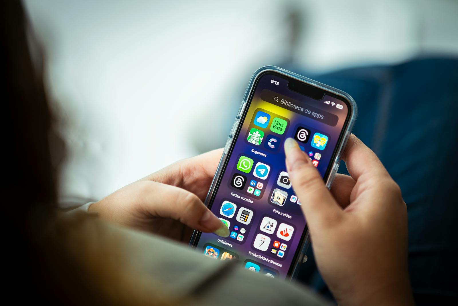 person scrolling phone anxiously