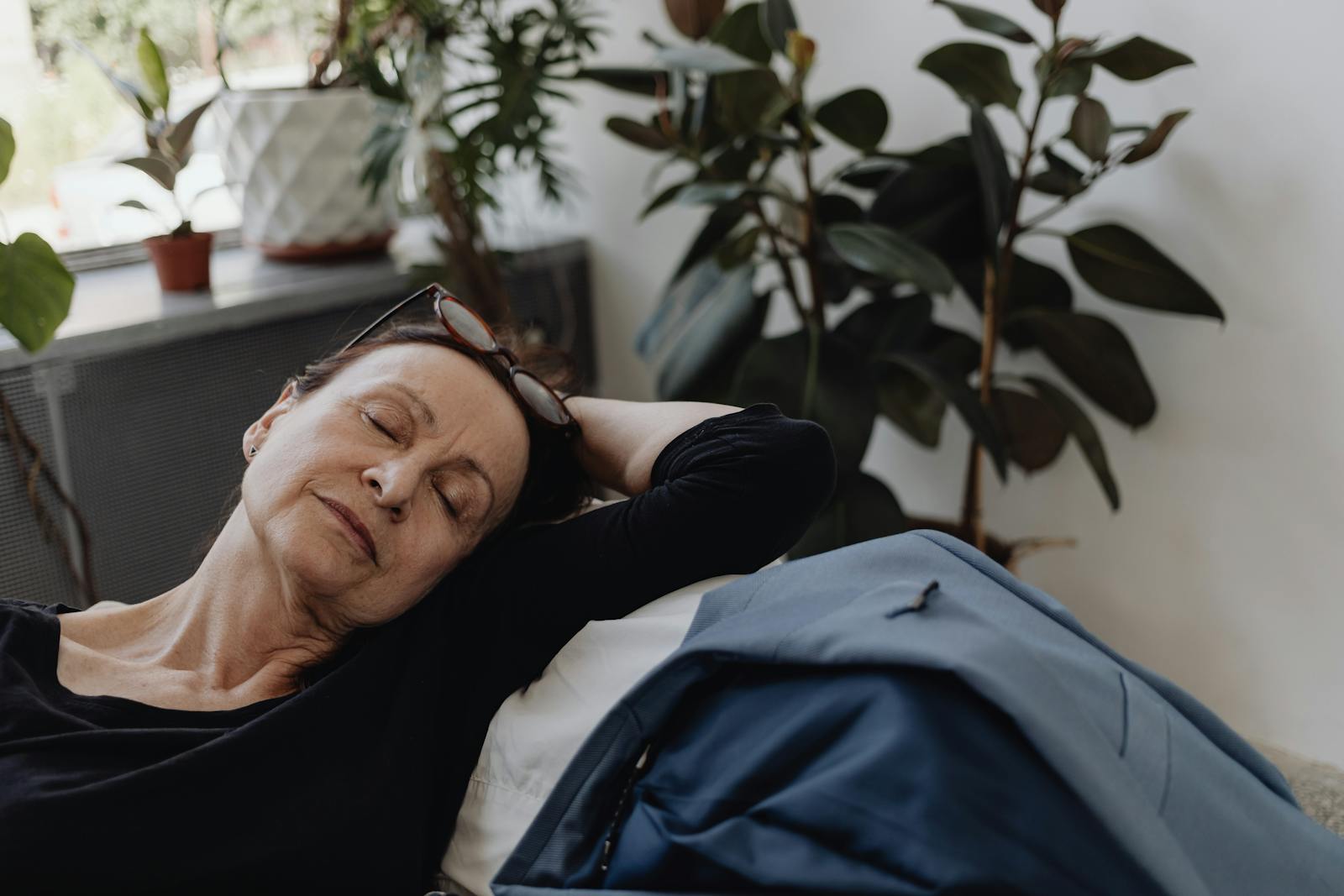 exhausted person pretending to smile