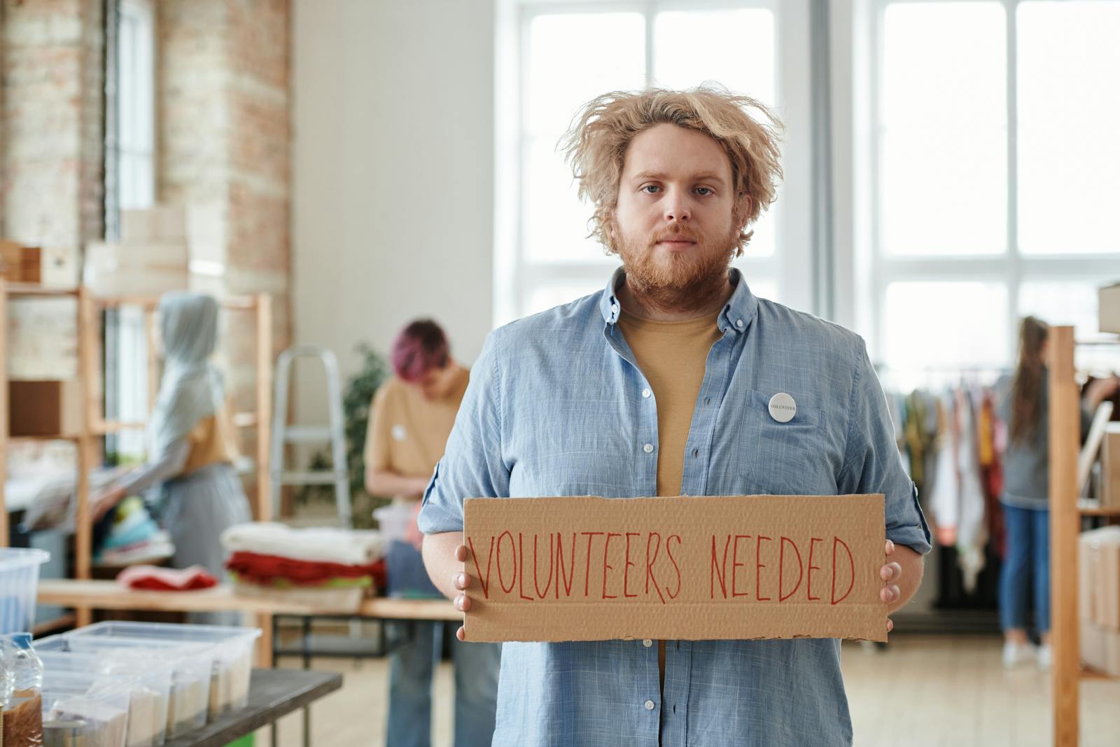 person helping others alone
