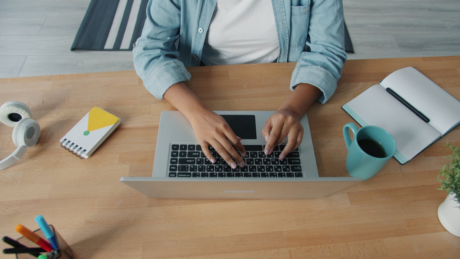 person typing thoughtfully