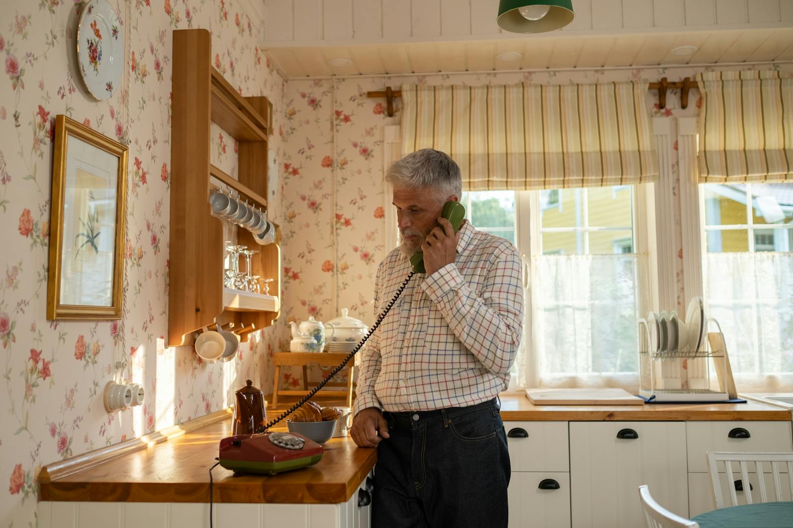 The generation that grew up with one shared phone in the hallway learned something their children never had to: how to be bored in front of other people without reaching for an escape