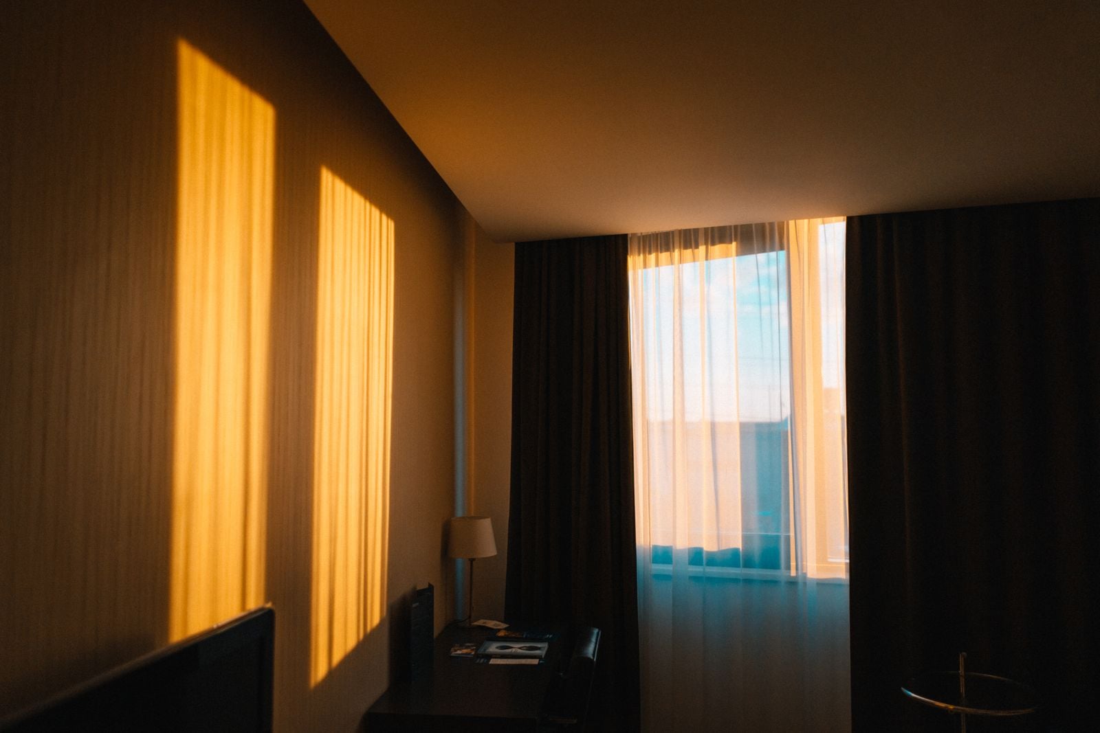 Adults who light a candle, make the bed, and open the curtains before doing anything else aren't performing wellness, they're staging a small daily proof that the day belongs to them before anyone else gets to make a claim on it
