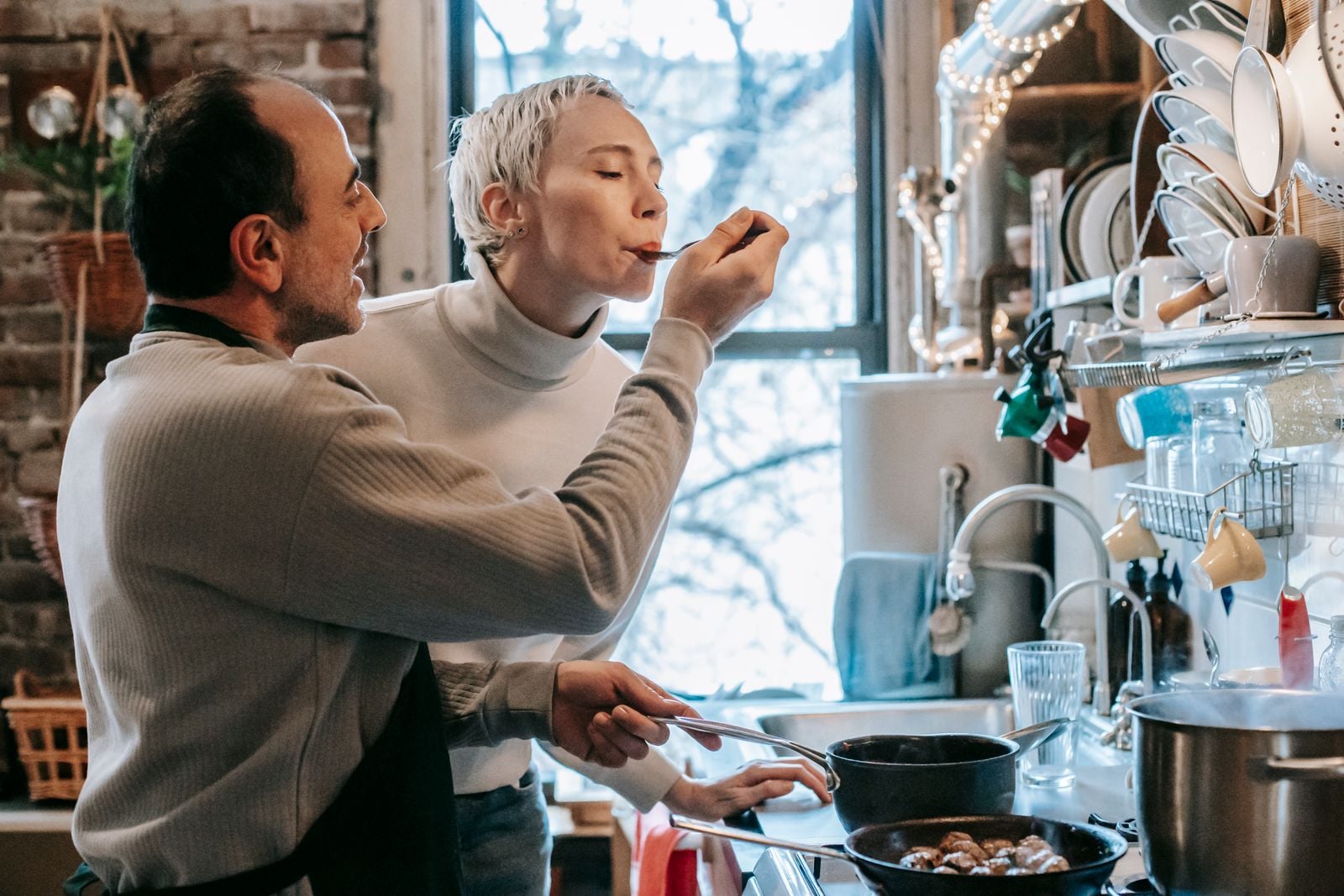 couple kitchen evening