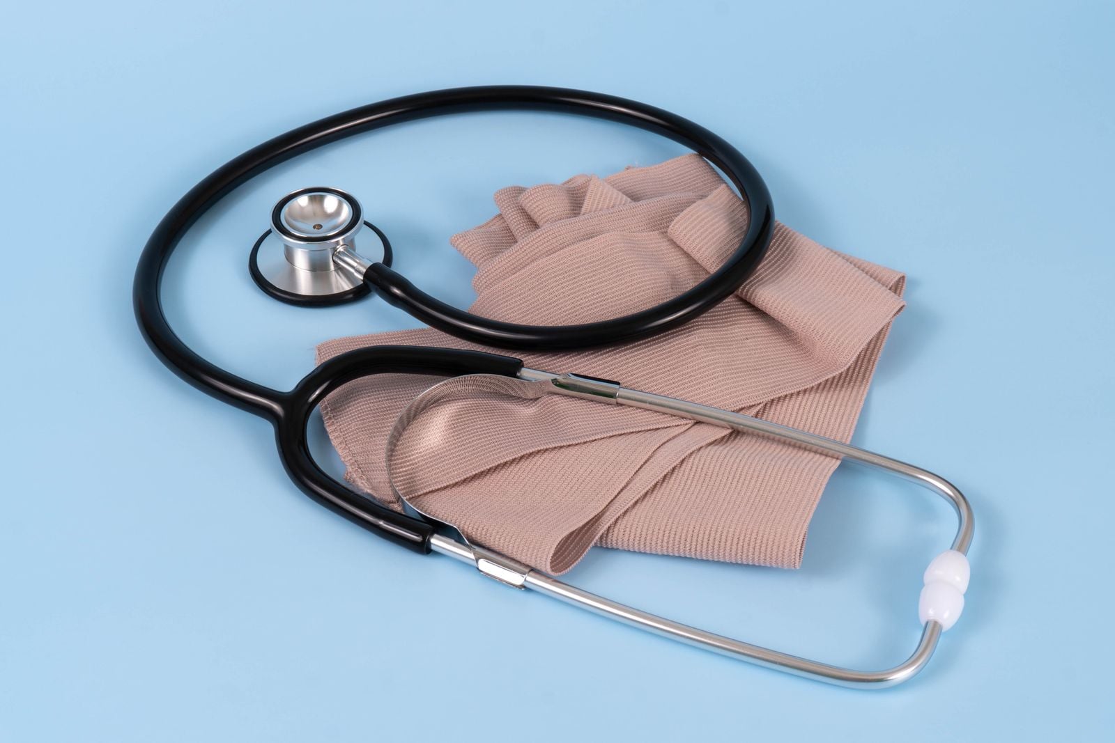 In 1816, a 35-year-old French physician named René Laennec rolled a sheet of paper into a tube and pressed it against a young woman's chest because he was too embarrassed to put his ear there, and the sound of her heartbeat through the cylinder became the first stethoscope