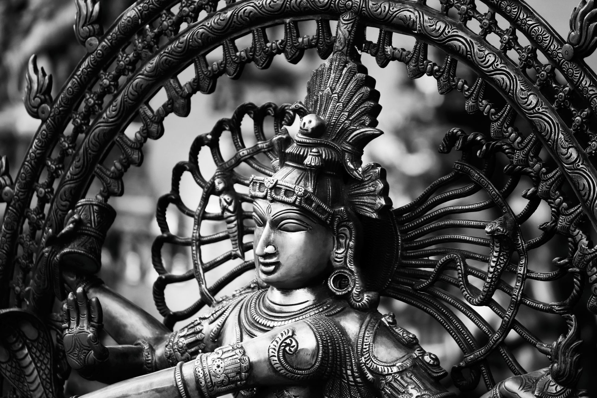 Detailed grayscale image of a Hindu Nataraja sculpture symbolizing cosmic dance.
