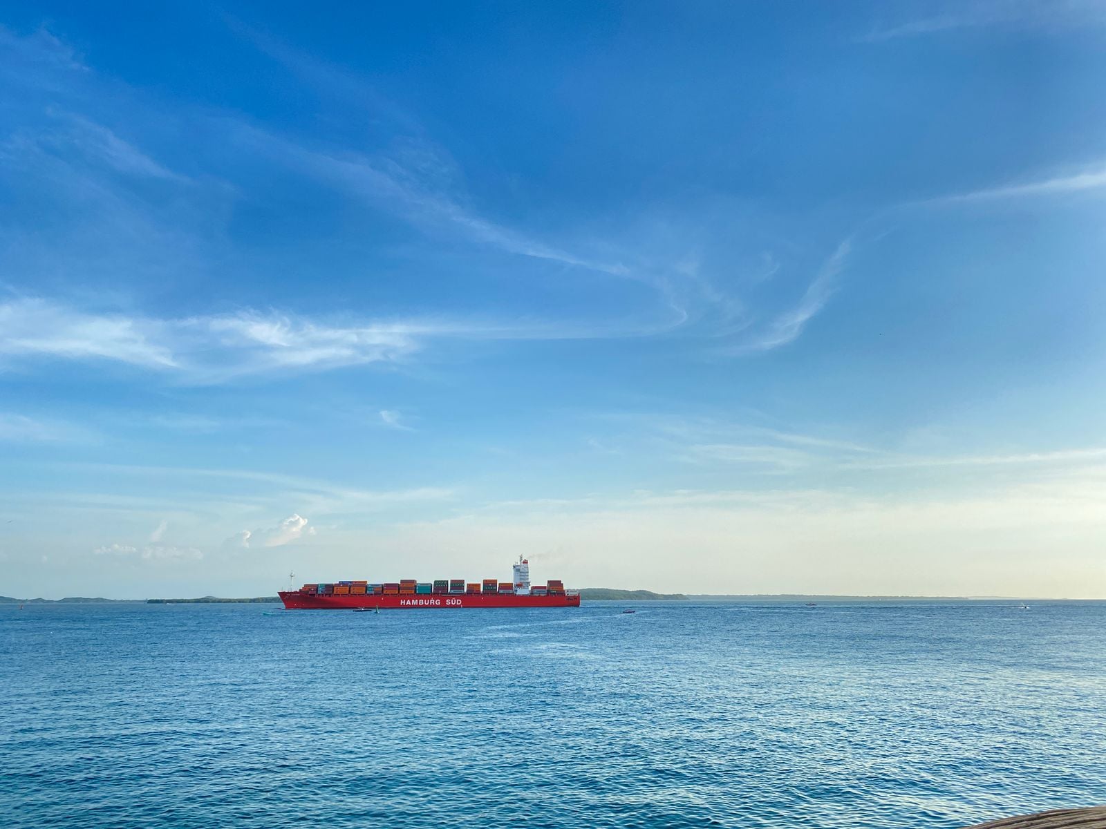 QatarEnergy is rushing empty LNG carriers back through Hormuz for the first time in months — and a Ras Laffan explosion on the eve of the restart is complicating the story the market wants to tell