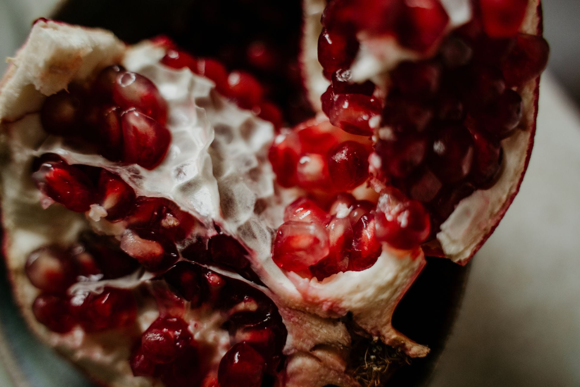 Two people can eat the identical bowl of pomegranate seeds and only one receives the anti-aging payoff — the difference comes down to a set of gut bacteria the majority of us simply don't carry