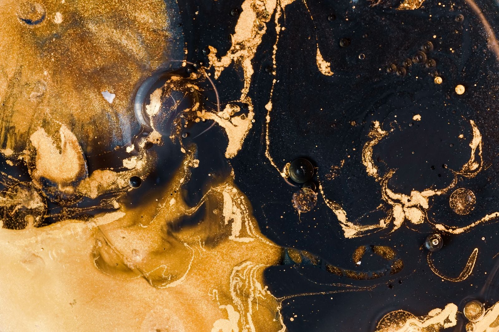 We tend to picture gold as an Earth metal pulled from mines, but every atom of it, in every wedding ring and central bank vault, was forged in the collision of two neutron stars before the Sun existed and rained onto the young Earth as stellar shrapnel